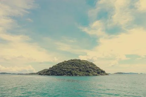 Island on sea with cloud Stock Photos