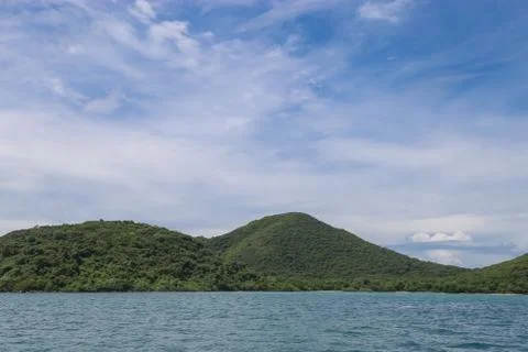 Island on sea with cloud Stock Photos