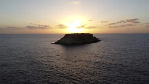 Island With Sunrise/Sunset Behind Video stock 255706533