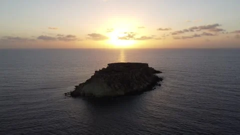 Island With Sunrise/Sunset Behind Video stock 255706539