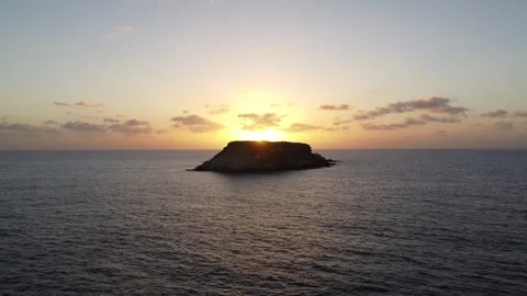 Island With Sunrise/Sunset Behind Video stock 255707048
