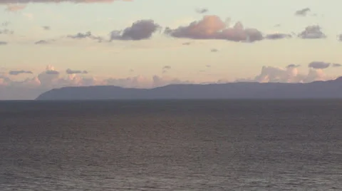 ISLAND AT SUNSET Stockbeeldmateriaal 24674901