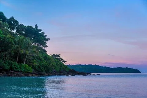 Island in sunset Stock Photos