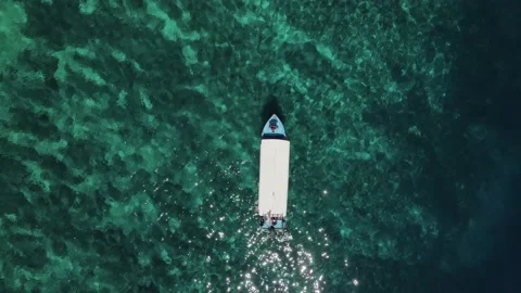 Island sunset view from drone an sail boat yacht Stock Footage 237499536