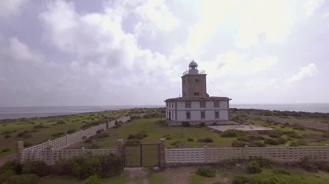 Island Tabarca aerial view Lighthouse cinematic 2K video Stock Footage 128060894