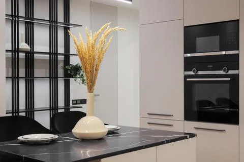 Island table in the kitchen in the interior Фото