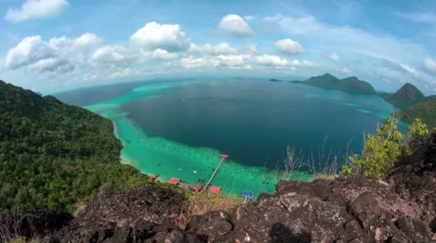 Island view of blue ocean with clouds movement time lapse Stock Footage 48920142