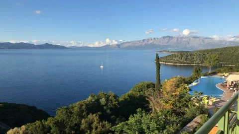 Island View with Pool Ocean and Mountains 4K Stock Footage 107834888