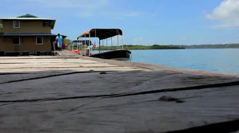 Islander Walks on Boat Dock Stock Footage 9277104