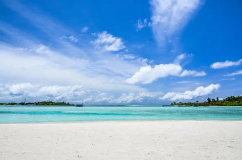 Islands in the lagoon under a cloudy sky Stock Photos
