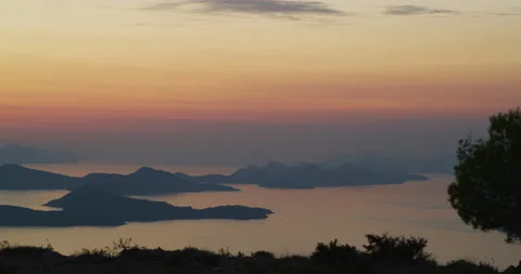 Islands in the sea, at sunset Stock Footage 216573357