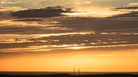 Isle of Anglesey Windmill Sunset over Irish Sea Stock Photos