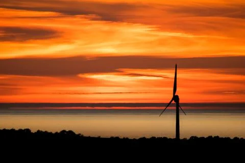 Isle of Anglesey Windmill Sunset over Irish Sea Stock Photos