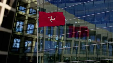 Isle of Man Flag Waving On A Skyscraper Building Stock Footage 146143657