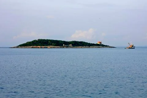 Islet of Host on the exit of Vis harbor Stock Photos
