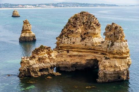 Islets in front of the Boneca beach, with the San Roque beach in the backgr.. Stock Photos