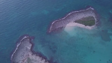 Islets in the ocean aerial view shot from 4k drone Video stock 85129426