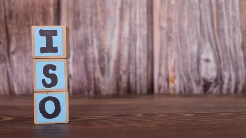 ISO certification concept. Human hand spell word ISO on wooden blocks. Stock Footage 263008116