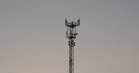 Isolate against the sky the tower of a radio telecommunications. Closeup aerial Stock Footage 133284095
