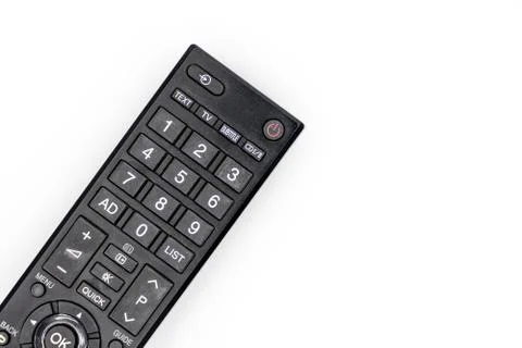 Isolate black TV remote on white in the light Stock Photos