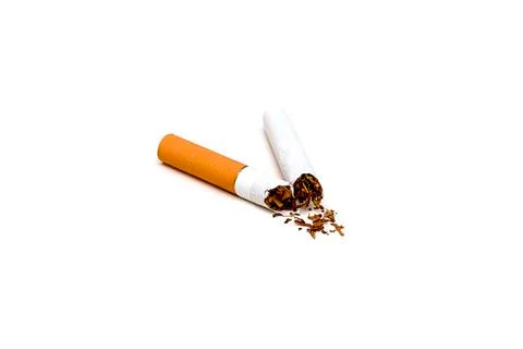 Isolate of broken in half cigarette with orange filter Stock Photos