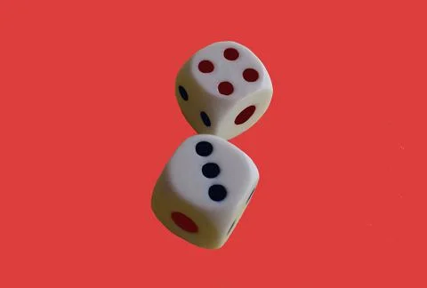 Isolate dice on red background Stock Photos