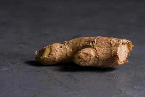 A isolate ginger on a rustic grey table Foto stock