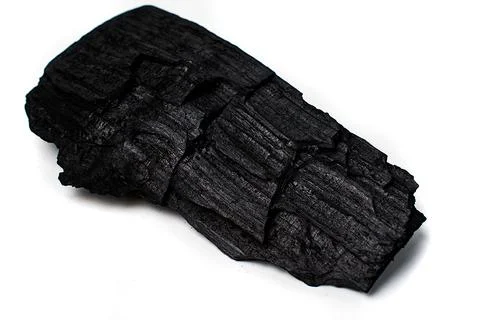 Isolate of a large lump of black coal. Stock Photos
