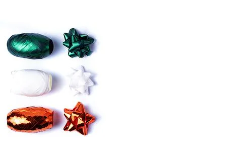 Isolate of ribbons and bows in three colors - green, white and red. Ribbons f Stock Photos