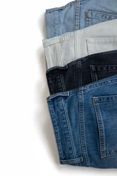 Isolate set of different denim pants Stock Photos