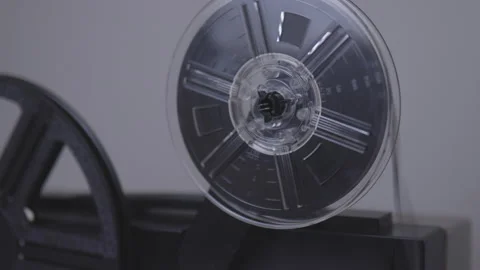 Isolated 8mm projector. Antique video technology. Film strip close-up Stock Footage 147869887