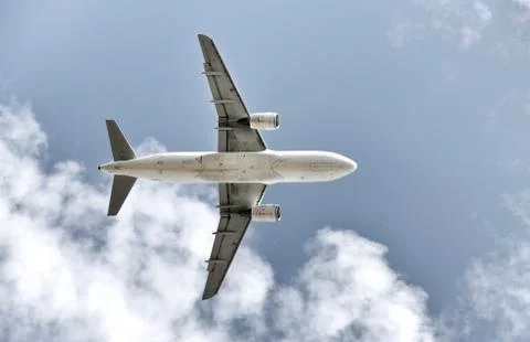 Isolated airplane seen from below Stock Photos