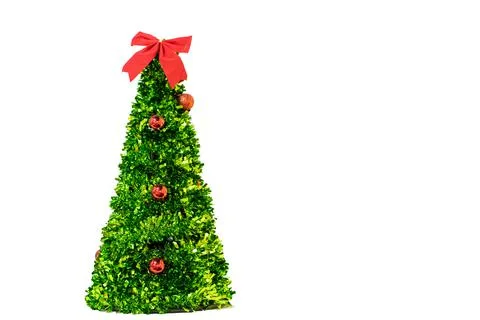 Isolated artificial green christmas tree with red balls and bow, copy space Stock Photos