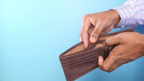 Isolated background of person holding an empty wallet credit card debt expenses 스톡 동영상 336450626
