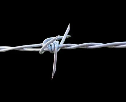 Isolated barbed wire on the black background Stock Photos