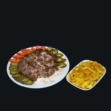 Isolated Beef or lamb meat doner plate in a Restaurant Stock Photos