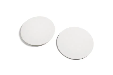 Isolated beer coasters Stock Photos