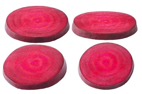 Isolated Beetroot. Different angels of beetroot slices isolated on white Stock Photos