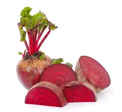 Isolated beetroot. One fresh red beet with leaves and a half isolated on whit Stock Photos
