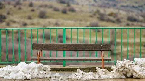 Isolated bench after snowfall Stock-Fotos