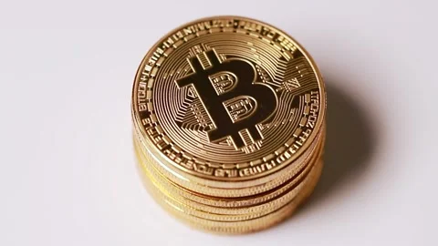 An isolated bitcoin turning 스톡 동영상 150017704