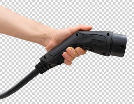Isolated black EV charging plug in female hand. Electric car charging connector. Stock Photos