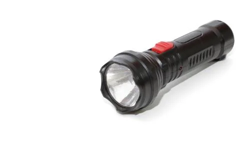Isolated black flashlight on white background Stock Photos