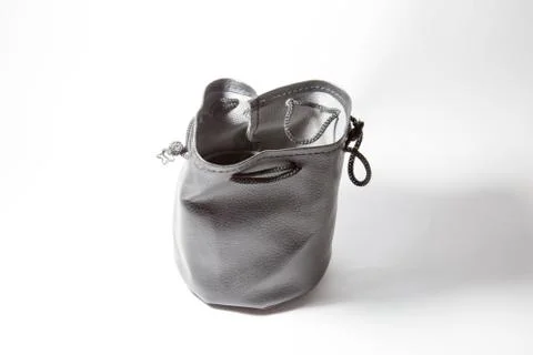 Isolated black leather pouch empty single Foto stock