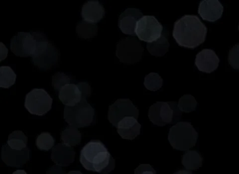 Isolated bokeh on black background Stock Illustration