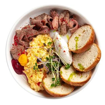 Isolated breakfast with scrambled egg and beef Stock Photos