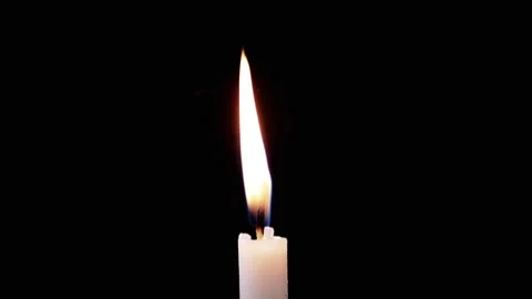 Isolated Burning Candle with Bright Flame on Dark Background with Falling Snow 스톡 동영상 312013514