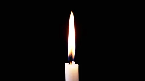 Isolated Burning Candle with Bright Flame on Dark Background Stock Footage 312013823
