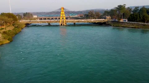 Isolated cable bridge over ganges river at evening Stock Footage 191414373