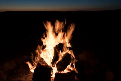 Isolated camp fire on black Stock Photos